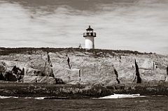 Pond Island Light Over Rocky Cliffs- Sepia Tone